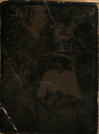 Unknown Black woman in very faded photo