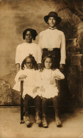 Carrie Stewart and her daughters, Ella (back left), Gertrude (front left), and Callie (front right)