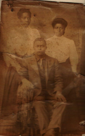 Unknown Black man and two women