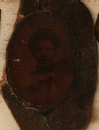 Unknown Black woman, very faded