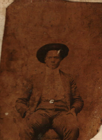 Unknown man, seated