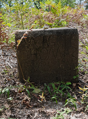 The grave of Maggie Thomas.